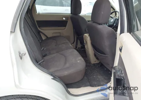 2009 Mazda Tribute I Touring z USA, uszkodzony, nr VIN 4F2CZ02779KM00801